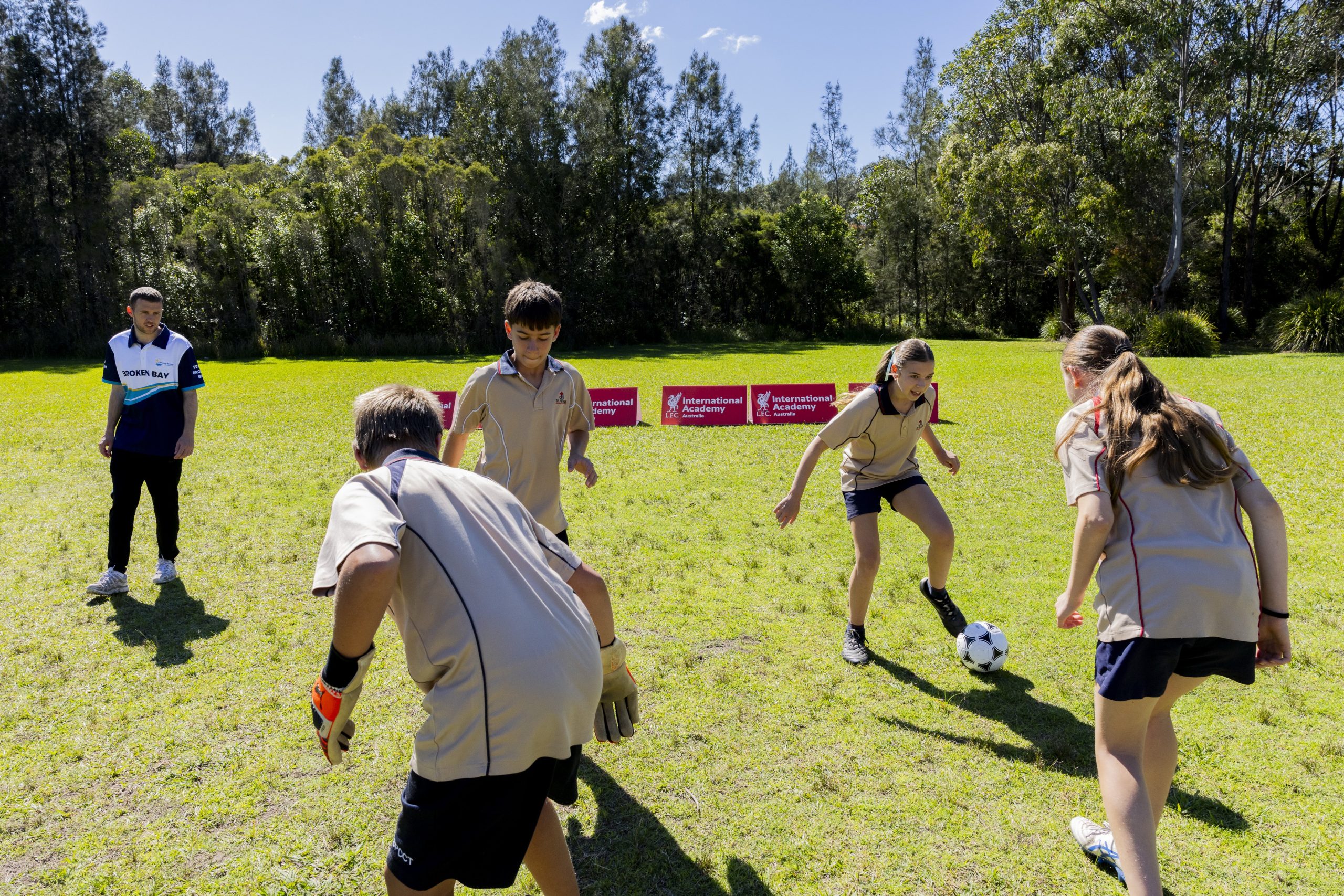 St Peter’s students playing football together.